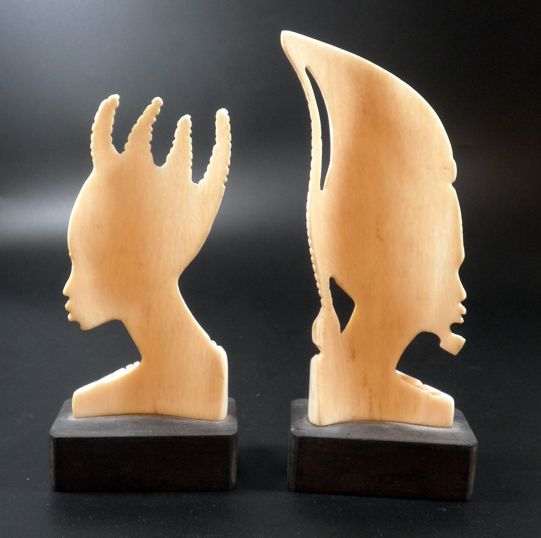 Man and woman old quality African ivory carvings