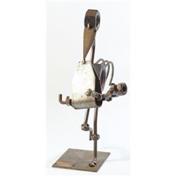 Vintage sculpture of a stork carrying a baby, designed by Hinz & Kunst