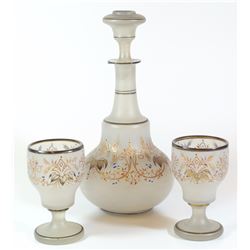 Antique glass decanter and a pair of goblets