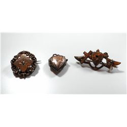 Lot of 2 antique gilt brooches and a locket