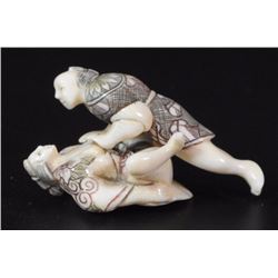 Erotic ivory figurine