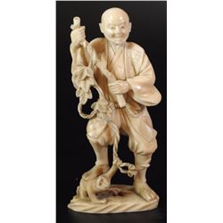 The man and the monkey - antique Japanese ivory carving