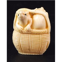 Ivory netsuke, mice crawling out of a basket