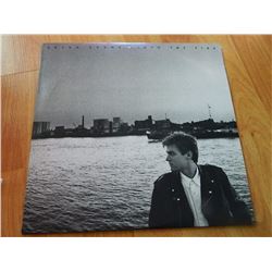 VINYL RECORD - BRYAN ADAMS - INTO THE FIRE - SP 503907- condition - really good