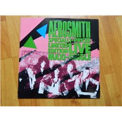 VINYL RECORD - AEROSMITH - SPECIAL PRICED LIMITED EDITION LIVE MAXI SINGLE - 92 05010 - 45 RPM - con