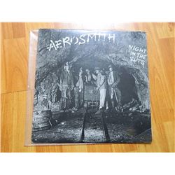 VINYL RECORD - AEROSMITH - NIGHT IN THE RUTS - AL 3605 - condition - really good