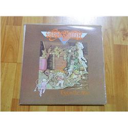 VINYL RECORD - AEROSMITH - TOYS IN THE ATTIC - AL 33479 - condition - really good