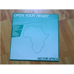 VINYL RECORD - OPEN YOUR HEART - AID FOR AFRICA - OXFAM 002 - condition - really good
