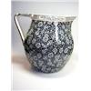 Image 1 : An early 20th century Wedgwood jug retailed by Heal and Son and printed with a chintz of white rose.
