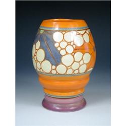 A Clarice Cliff Fantasque 'Broth' pattern vase, the ovoid girth painted with brown bubbles above ho.
