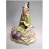 Image 1 : A Staffordshire Ballet Russe style figure, designed by Goldscheider, a lady wearing green top and l.