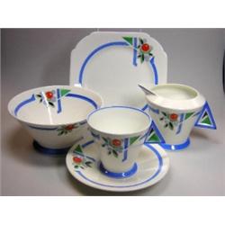 A 1930's Shelley Art Deco tea set, each piece decorated with the 11755 pattern of an orange and its.