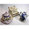 Image 1 : Three Quimper style inkwells, one in tones of blue modelled with fleur de lys sides, HB mark, 9.5cm.