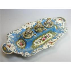 A mid 19th century Jacob Petit inkstand, birds painted on the handles of the turquoise rectangular..