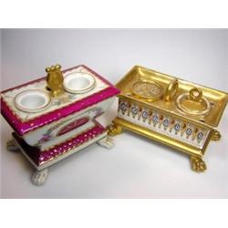 A mid 19th century Paris porcelain inkstand, the sides of the sarcophagus shape painted with Gothic.