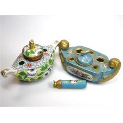 An early 20th century French inkstand and seal, the navette shape painted with roses on a deep turq.