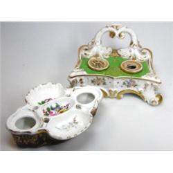 A mid 19th century Paris porcelain inkstand, a gilt handle raised behind the green top pierced to t.