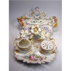 Two 19th century Paris porcelain inkstands, one with sander and inkwell, gilt flowers moulded behin.