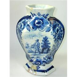 Der drei Klokken, a 19th century Dutch Delft blue and white vase, the baluster shape of hexagonal s.