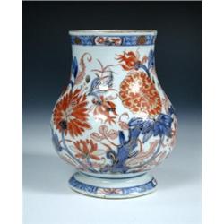 A mid 18th century Chinese Imari jar, the baluster shape pierced with four suspension holes above th