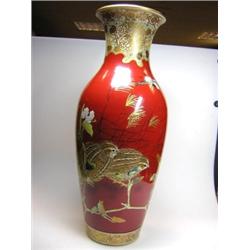 A pair of early 20th century Satsuma vases, the waisted necks of the baluster shapes gilt with broc.