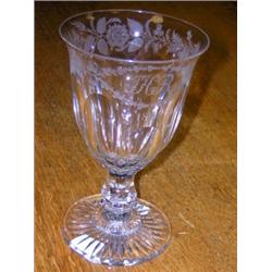 A cut and engraved glass goblet, dated 1838 and initialled JHR amongst intertwined national flowers.