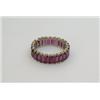 Image 1 : An eternity ring set with baguette cut rubies  £800-1,200...