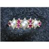 Image 1 : A late Victorian/Edwardian 18ct gold ring set with half pearls and rubies £100-150...