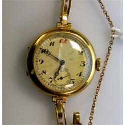 A 1930's lady's 18ct gold cased wristwatch the circular dial printed with Arabic numerals, subsidiar