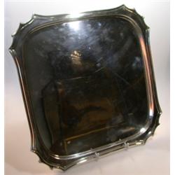 An electroplate salver by Boardman, Glossop & Sons, of rectangular shape with shaped and moulded sc.