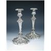 Image 1 : A pair of Victorian electroplate table candlesticks each raised from a lobed circular foot embossed.