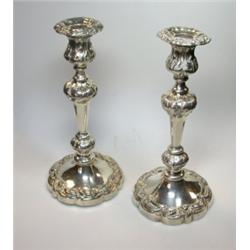 A pair of 19th century electroplate table candlesticks by W Briggs, Sheffield, each raised on a cir.