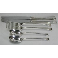 A quantity of modern American metalwares flatware, Serenity pattern by International, comprising tw.