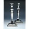 Image 1 : A pair of silver table candlesticks by Hawkesworth Eyre & Co, Sheffield 1932, each raised from a sq.