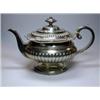 Image 1 : A George III Scottish silver teapot by J McKay, Edinburgh 1817, of compressed circular form, the lo.