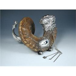 A fine 19th century Scottish ram's horn snuff mull, silver mounted (unmarked) with a cairngorm moun.
