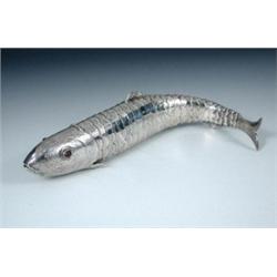 A late 19th century silver articulated fish, import marked for London 1896, the head with gem set e.