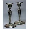 Image 1 : A pair of silver candlesticks by the Adie Brothers, Birmingham 1899, each raised on an oval part fl.