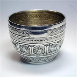 A Victorian silver sugar bowl by Henry John Lias and James Wakely, London 1883, embossed with the s.