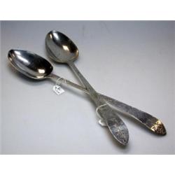 A matched pair of George III Irish silver bright cut serving spoons, one by William Ward the other..