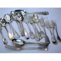 Seven mid 18th century silver Old English and Hanoverian pattern spoons, various makers and dates i.