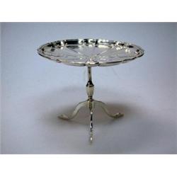An Edwardian silver miniature tripod table by William Hulbert Popley, London 1909, the multifoil to.