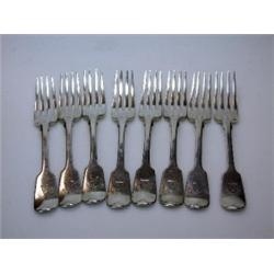 A set of eight Victorian silver fiddle pattern dessert forks, maker SS, London 1871, crested, 13.5o.