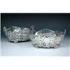 Image 1 : A pair of Edwardian silver cake or bread baskets by D & J Welby, London 1903, each of compressed ov.