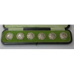 A cased set of six late Victorian silver coat buttons by Levi and Salaman, Birmingham 1900, embosse.