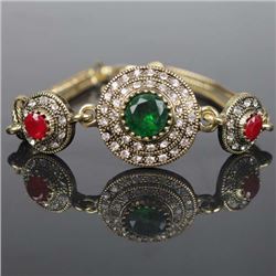 BRACELET - VINTAGE STYLE CRAFTING OF EMERALD LIKE GEM IN GERMAN STERLING SILVER SETTING WITH 18K GOL