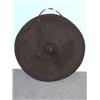 Image 1 : An Ethiopian leather shield moulded with central boss within concentric rings and the rolled rim, a.