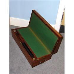 A 19th century mahogany writing slope, the rectangular lid enclosing green baize lined fall, ebony..