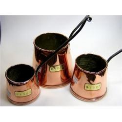 A graded set of three copper 'Cider' measures, each of the tapering cylindrical shapes with brass l.