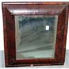 Image 1 : A late Stuart walnut cushion framed mirror, the later rectangular plate within oyster veneers and o.